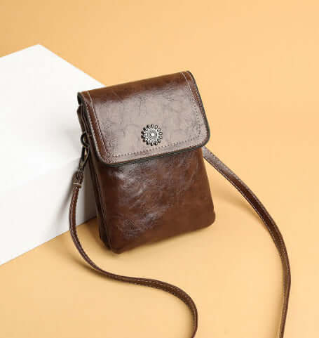 Fashion Simple Large Capacity Mobile Phone Bag Mini Crossbody Bag in brown, beautifully styled to capture attention with its rich texture. A stylish choice for a fashionable mini bag.