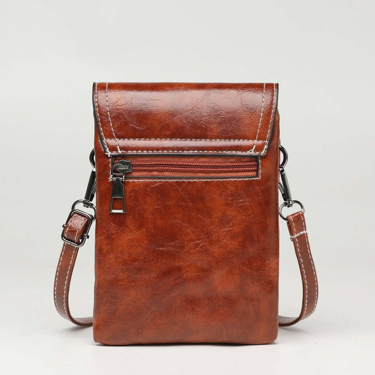 Fashion Simple Large Capacity Mobile Phone Bag Mini Crossbody Bag in brown color, emphasizing its elegant appearance and spacious interior. A perfect choice for a fashionable mini bag.