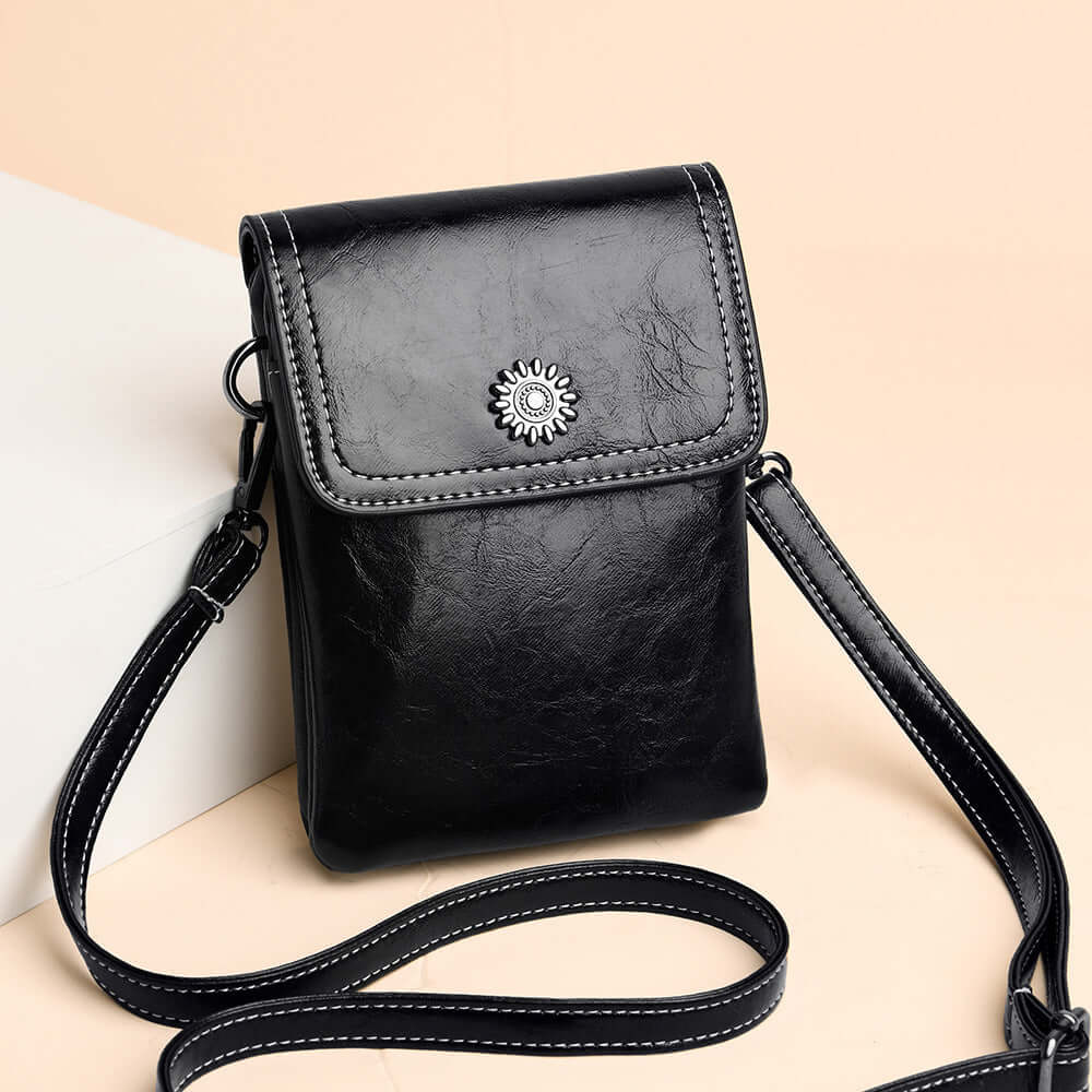 Fashion Simple Large Capacity Mobile Phone Bag Mini Crossbody Bag in black color, showcasing its stylish design and practical features. Ideal for those looking for a fashionable mini bag.