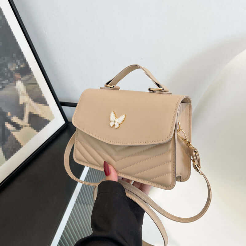 Dropshipman beige quilted faux leather Simple Crossbody Bag with gold butterfly clasp top handle and adjustable strap