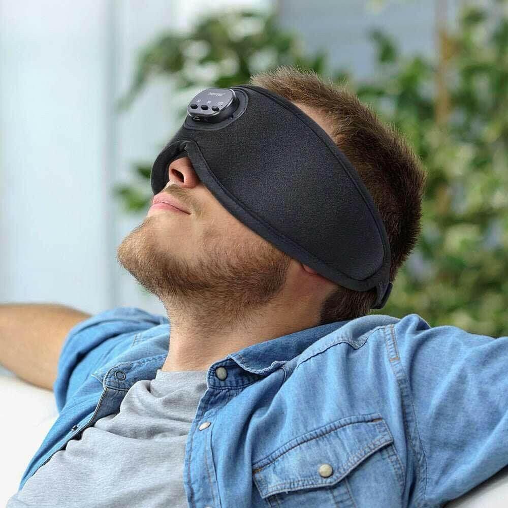 CozyTech Living full blackout smart sleep mask worn by relaxed man for improved sleep quality