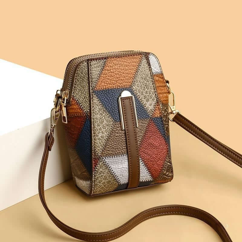 Soft Leather Shoulder Bag with geometric patchwork design and long adjustable strap in brown tones