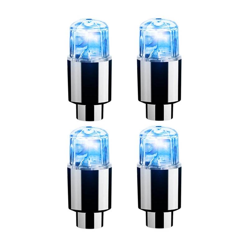 Set of four blue LED tire valve caps for cars, motorcycles, and bicycles. Waterproof and battery-powered for enhanced wheel visibility.