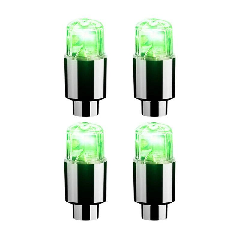 Set of four green LED tire valve caps for cars, motorcycles, and bicycles. Bright and stylish wheel accessory for night rides.