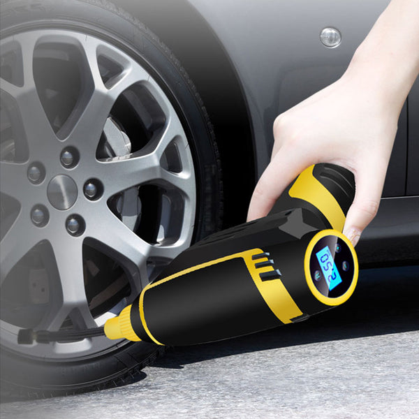 Compact car tire inflation pump being used as an electric tire inflator, showcasing its ergonomic design for easy handling.