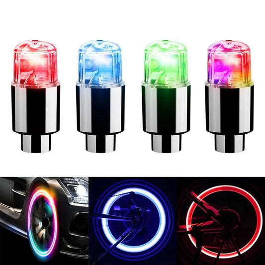 Set of four colorful LED tire valve caps in red, blue, green, and multicolor. Enhance wheel visibility and style for cars, bikes, and motorcycles.