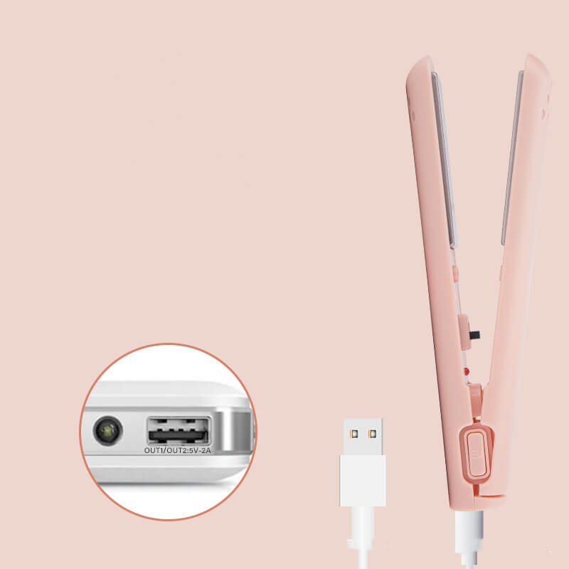 Close-up of USB Portable Wireless Hair Straightener in pink color with USB connection, showcasing usability for efficient styling as a portable hair straightener.