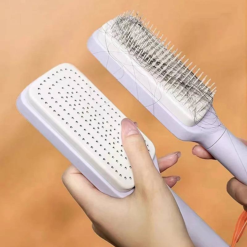 Close-up of the Self-Cleaning Brush by CozyTech Living being held, demonstrating its unique one-key cleaning feature with hair removal.