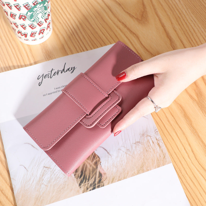 Women's Long Wallet Tri-fold Clutch in deep green color, designed for those seeking a stylish and functional wallet.