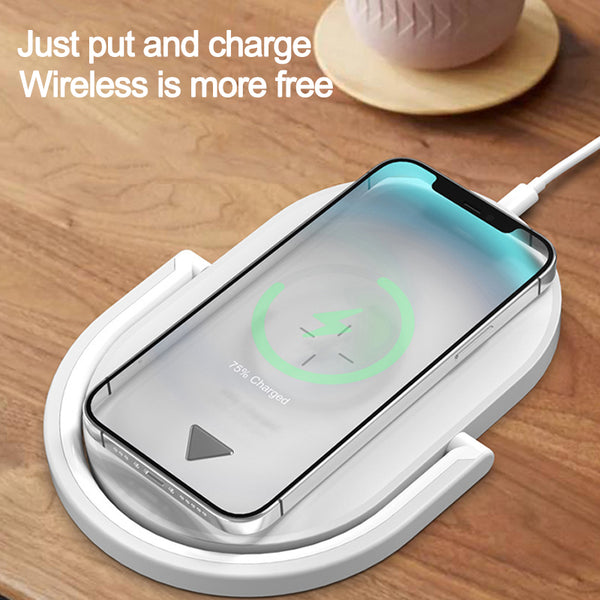 3 In 1 Wireless Charging Station With Adjustable LED Night Light And Phone Holder demonstrating convenience of just placing the phone to charge wirelessly.