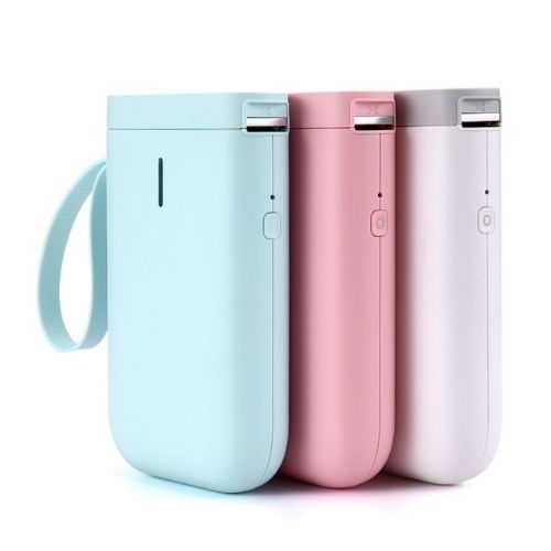 Collection of portable wireless label makers in various colors including mint green, pink, and white, highlighting the compact and stylish designs by CozyTech Living.