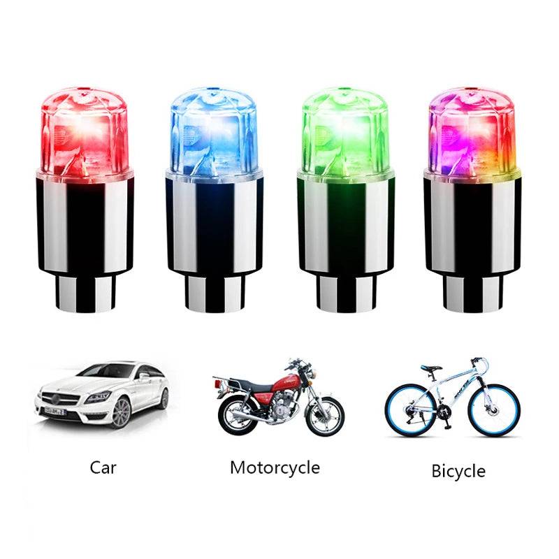 Four LED tire valve caps in red, blue, green, and multicolor, compatible with cars, motorcycles, and bicycles for a vibrant wheel effect.