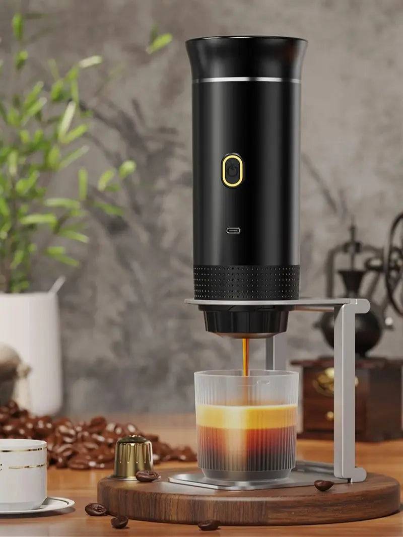 The Portable Coffee Maker from CozyTech Living in use, brewing coffee in a stylish setting with coffee beans and cups around.