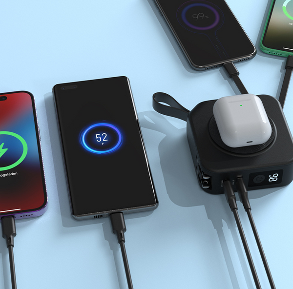 Dynamic scene showing the Five in one magnetic wireless power bank being used as a travel charger, efficiently powering multiple devices simultaneously.