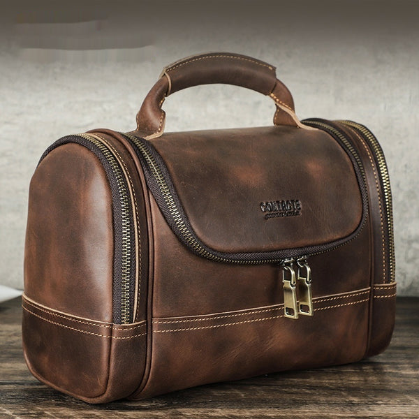 Vintage Cowhide Multi-Training Bag Portable Pouch displayed on a wooden surface, showcasing its sleek design and high-quality craftsmanship; perfect vintage cowhide bag for women.