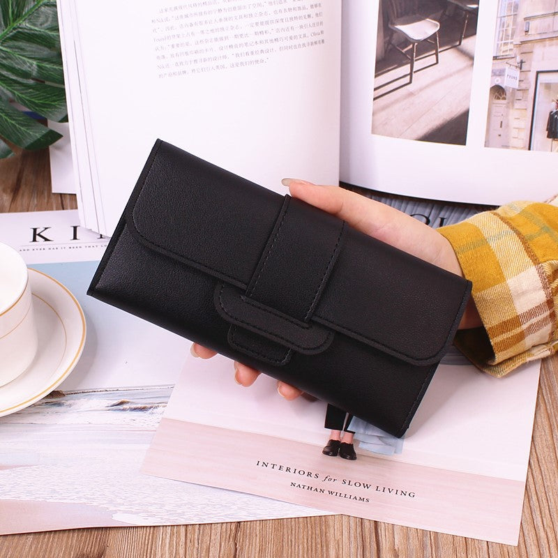 Women's Long Wallet Tri-fold Clutch in classic black, combining style and functionality with a large capacity.