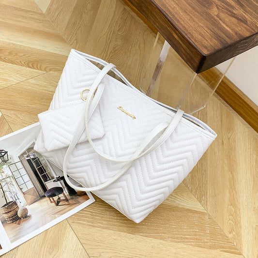 Women's Shoulder Bag with Wave Pattern Diamond Plaid Embroidery, featuring a fashionable shoulder bag design in white, laid on a wooden surface.