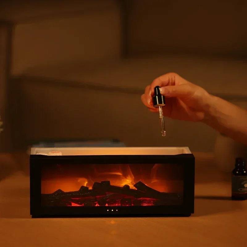 Hand adding essential oils to the Fireplace Humidifier, highlighting its feature of diffusing aromatic scents along with humidifying.