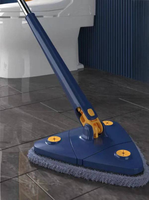 Self-Squeeze Triangular Mop positioned on a shiny tiled floor, showcasing its unique triangular design for effective cleaning in corners and tight spaces. Mop, Self-Squeeze, Triangular.