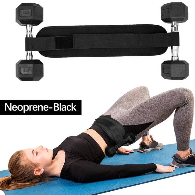 The Hip Thrust Belt Glute Bridge Pad in black, featured in a gym setting during a glute bridge exercise, highlighting its role in effective fitness training.