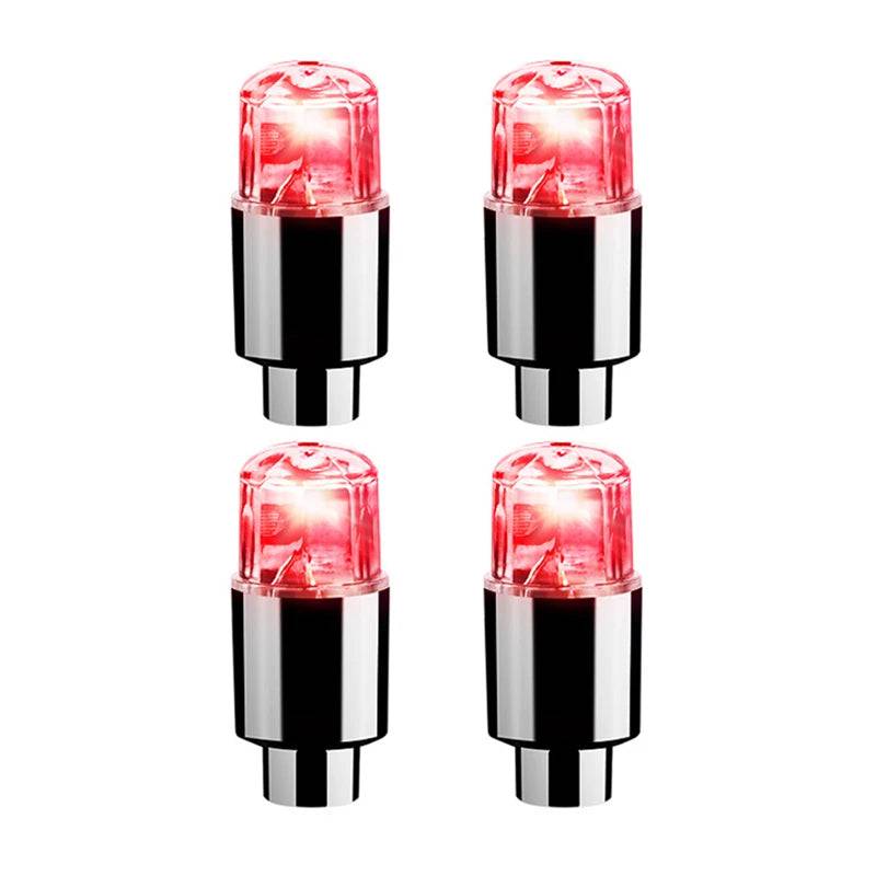 Set of four red LED tire valve caps for cars, motorcycles, and bicycles. Enhances night visibility and adds a stylish touch to wheels.