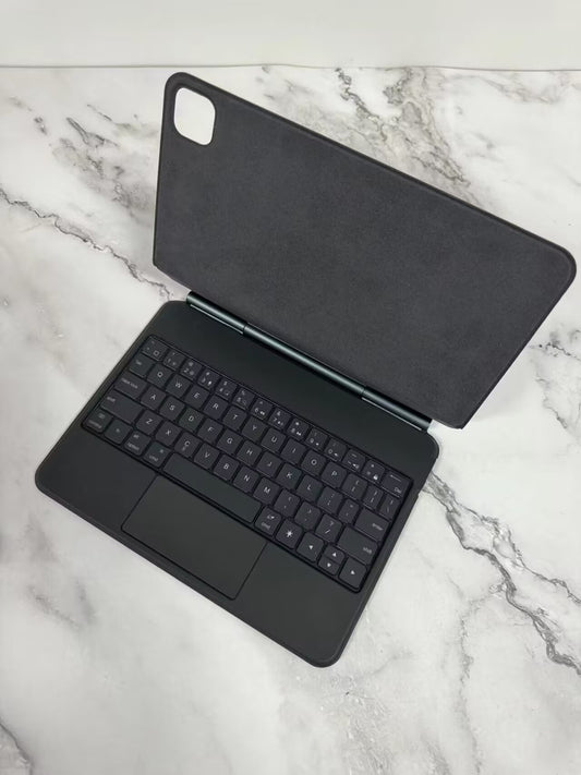 Keyboard Bluetooth Tablet Magnetic Suspension Integrated in a modern black design, perfect for Apple, and serves as an efficient bluetooth tablet keyboard.