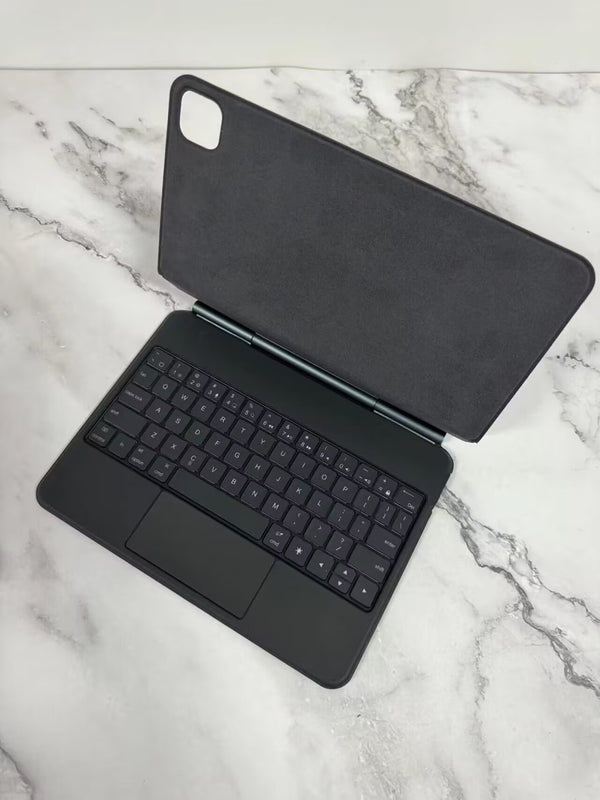 Keyboard Bluetooth Tablet Magnetic Suspension Integrated in a modern black design, perfect for Apple, and serves as an efficient bluetooth tablet keyboard.