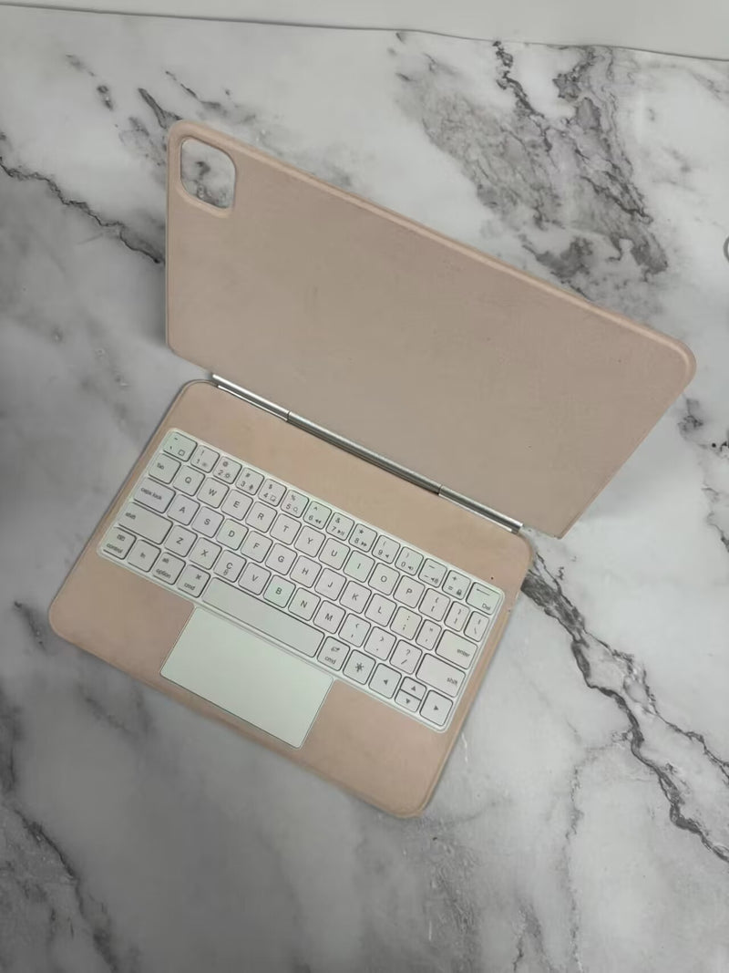 Stylish pink Keyboard Bluetooth Tablet Magnetic Suspension Integrated for Apple products, offering a contemporary look as a bluetooth tablet keyboard.