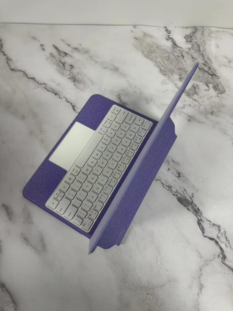 Vibrant purple Keyboard Bluetooth Tablet Magnetic Suspension Integrated suitable for Apple, combining elegance and functionality as a bluetooth tablet keyboard.