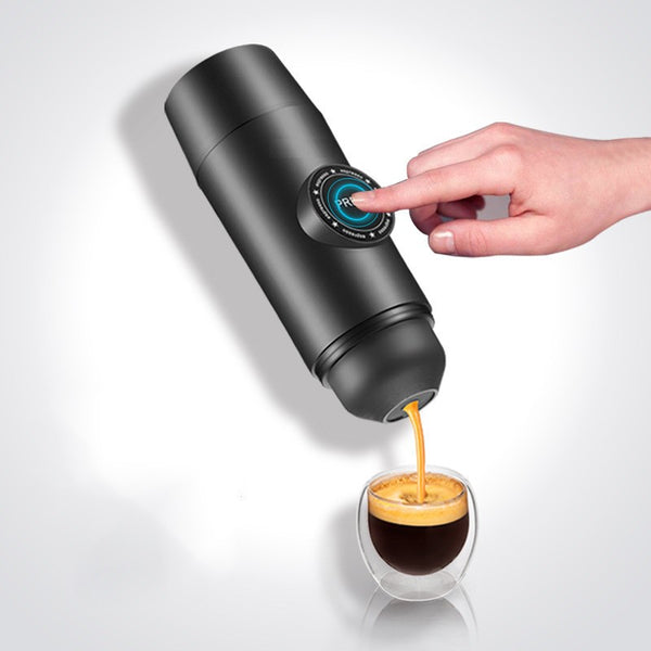 User pressing the button on the Mini Espresso Coffee Maker Portable Rechargeable Mech, illustrating the ease of use for preparing fresh espresso using this compact espresso machine, an essential for coffee enthusiasts.