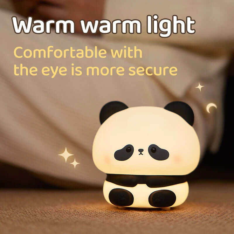 Cute LED Night Light - Rechargeable Silicone Touch Lamp with a panda shape, providing warm illumination for children's bedrooms.