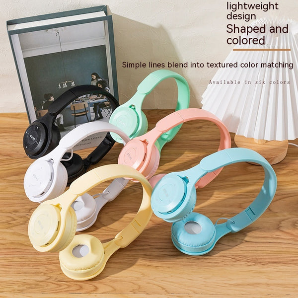 A vibrant assortment of foldable bluetooth headsets in multiple colors including white, black, pink, blue, green, and yellow, showcasing their lightweight design and stylish look suitable for music and calls.