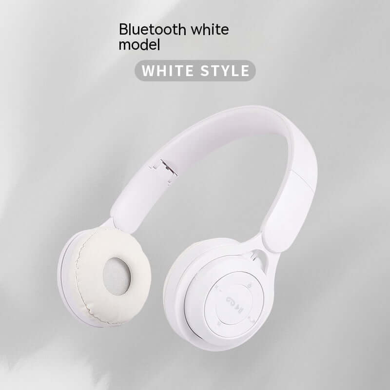 White model of foldable Bluetooth Headset featuring a sleek design and plush ear padding.