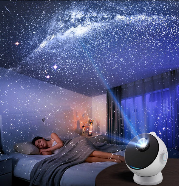 A soothing scene of a woman sleeping under a dazzling display created by the Galaxy Projector Lamp, showcasing starry light projections on the ceiling, enhancing relaxation and ambiance.