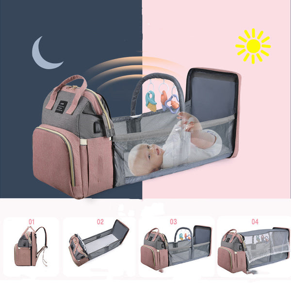 New Mummy Baby Crib Backpack with a sleeping baby inside, designed for comfort and convenience, featuring an insulated milk storage compartment.