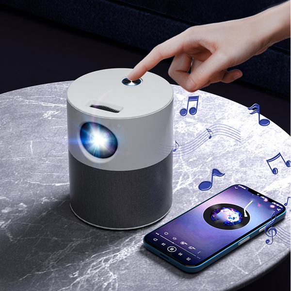 Compact and stylish mini home projector in use, perfect for creating a cinematic experience at home.