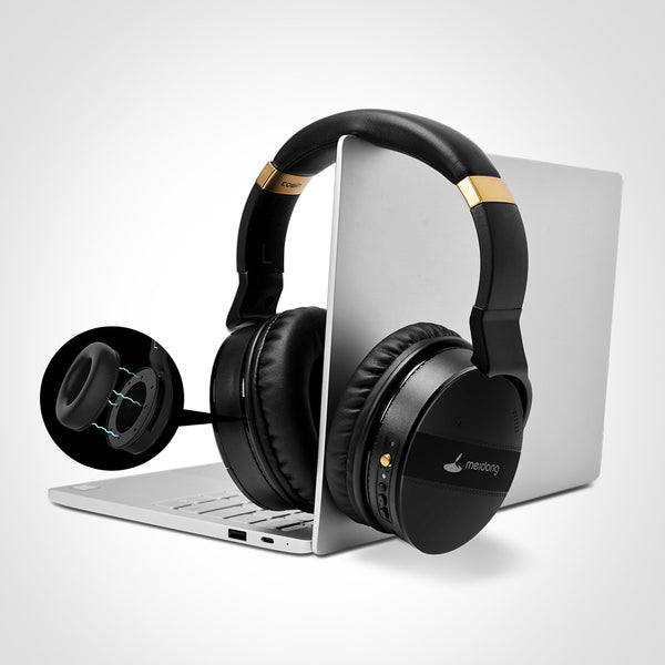 Noise Canceling Headphones for Computer and Mobile use, showcasing design next to a laptop, perfect for gaming with wireless capability.