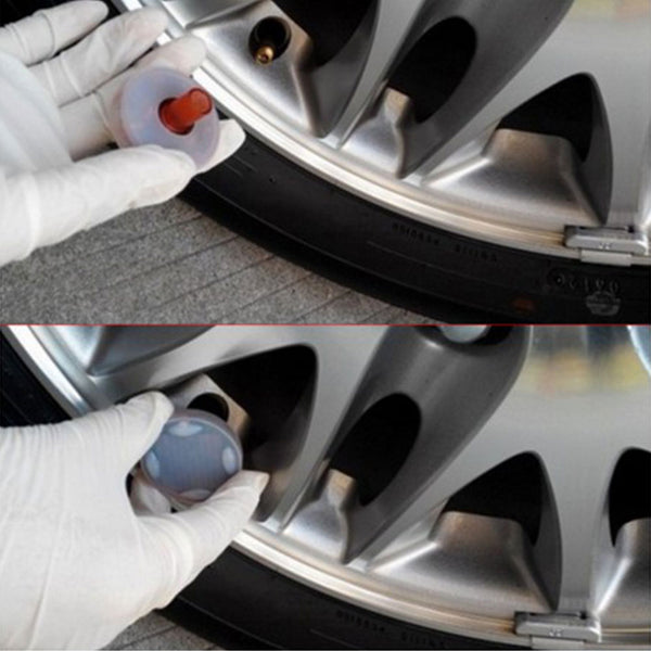 Installation of solar powered wheel lights on a car tire with gloves, showcasing the simple setup of decorative solar lights for wheel hubs.