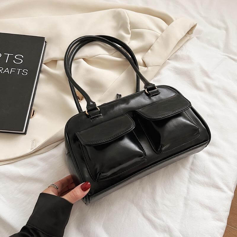 Stylish black Multi-pocket Design Shoulder Bag, perfect for women, offering a beautiful blend of fashion and functionality as a must-have multi-pocket handbag.