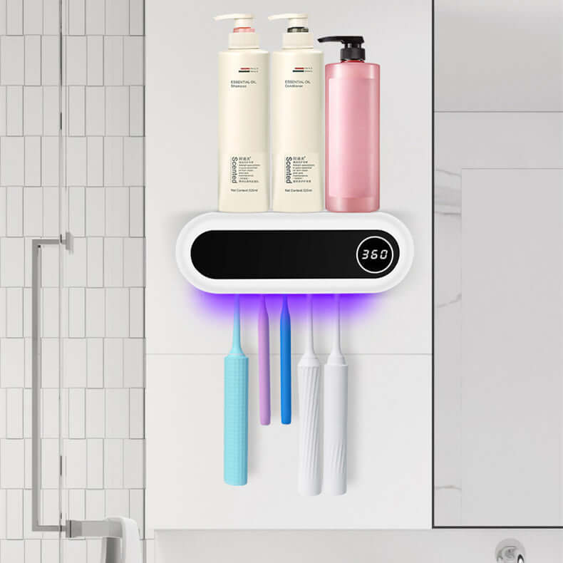 The Wall Mounted Toothbrush Sterilizer Holder displayed with various toiletries organized above, demonstrating its stylish and practical design as a toothbrush sterilizer holder for bathroom use.