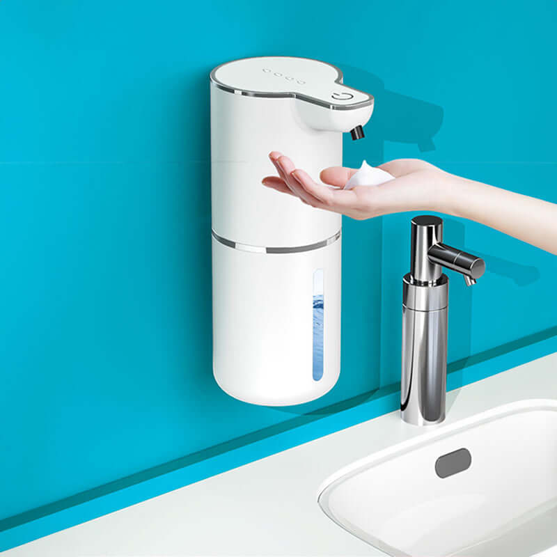 Eprolo automatic soap dispenser touchless mounted on blue wall dispensing foam into hand