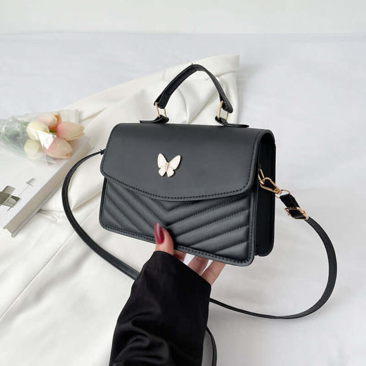 Dropshipman Simple Crossbody Bag black quilted chevron pattern with top handle gold butterfly clasp and adjustable strap