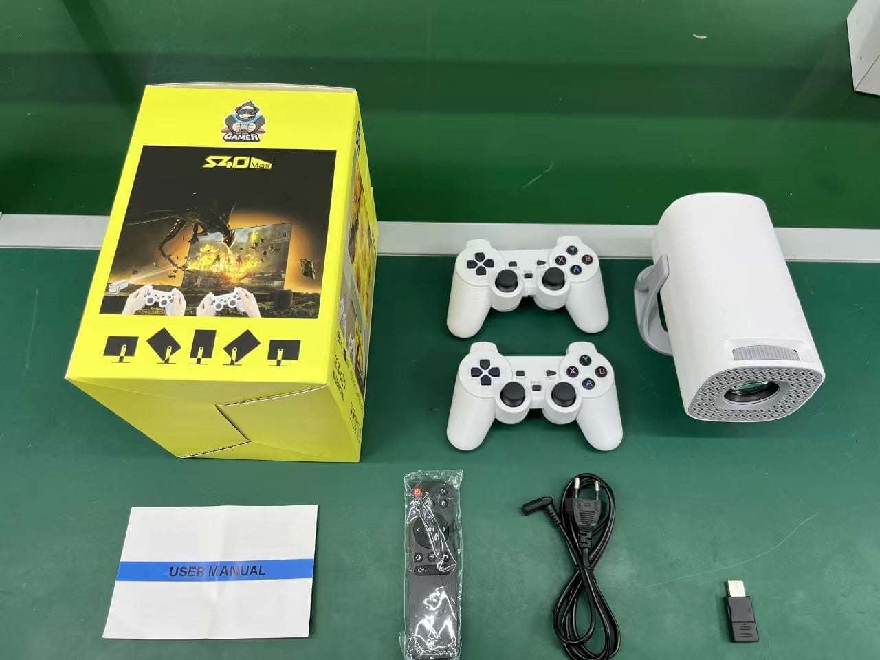 eprolo portable 4K projector for gaming with two white controllers, remote, cables, and user manual