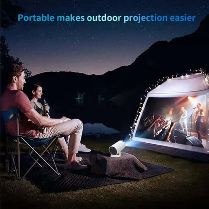 Couple watching outdoor concert projected on tent using portable android smart projector at night