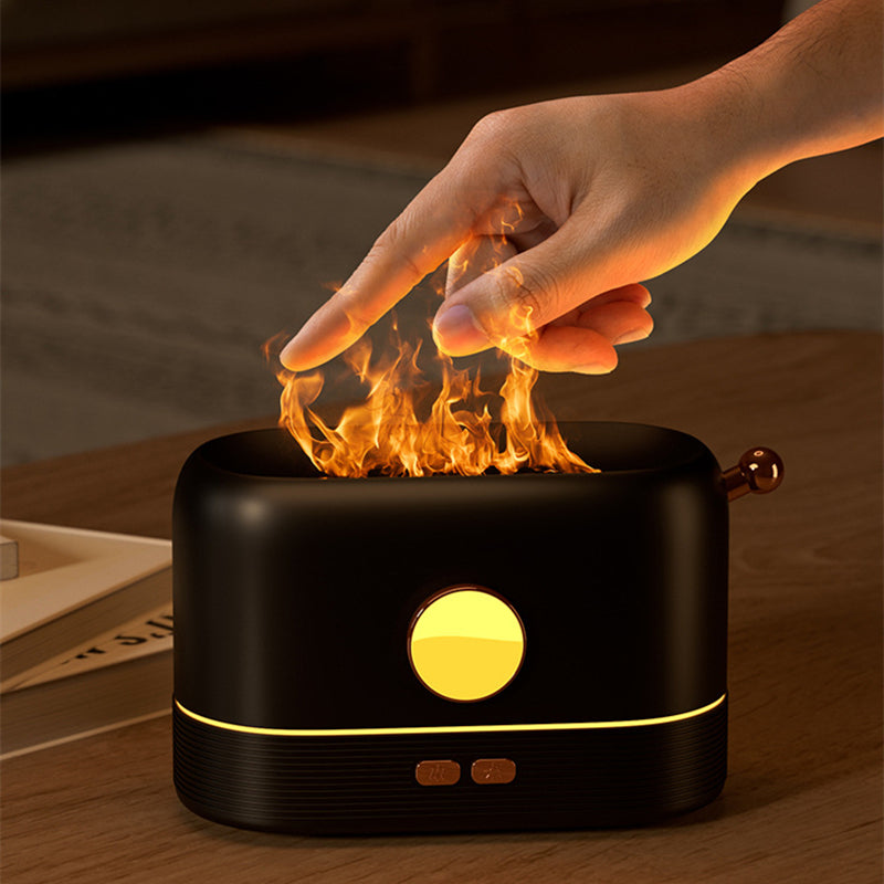 User interacts with a black Simulation Flame USB Humidifier Home Desktop Fragrance Diffuser demonstrating the flame effect.