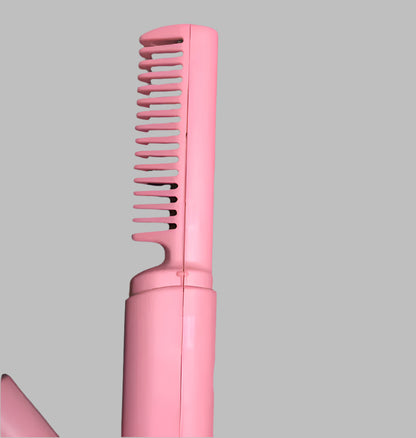 Pink cordless hair straightening brush with wide teeth for smooth styling