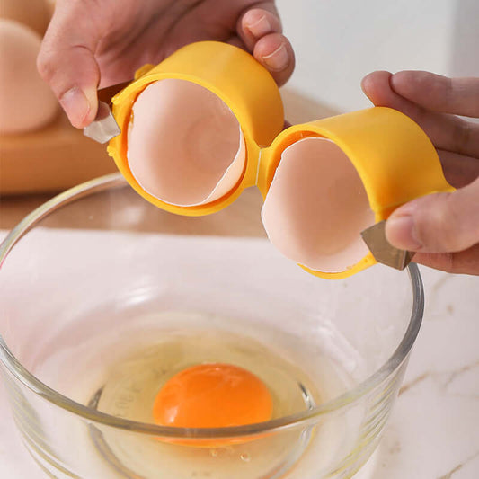 eprolo easy egg cracking device in yellow separating egg shell from yolk into glass bowl
