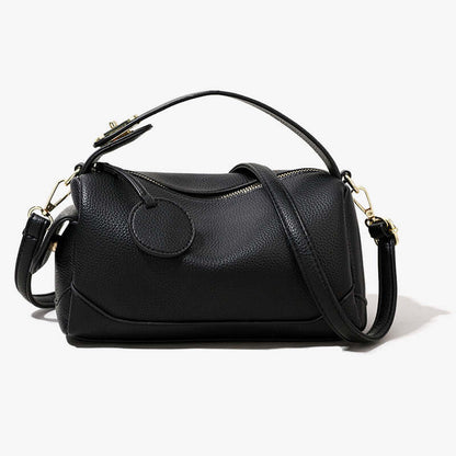 Crossbody Soft Leather Large Capacity Pillow Bag - A black handbag for women shown from the front, highlighting its stylish features.