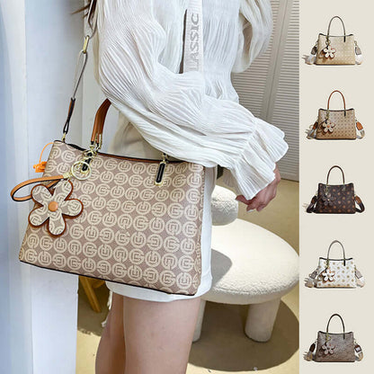 Fashion printed tote bag for women in beige with flower charm and shoulder strap by Dropshipman