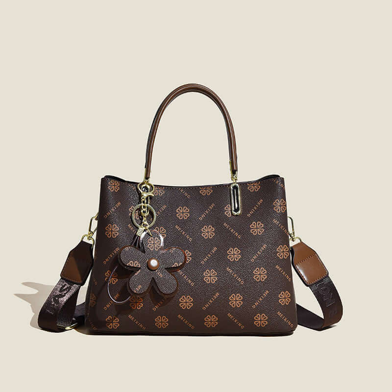 Fashion printed tote bag for women in brown with floral charm and adjustable shoulder strap